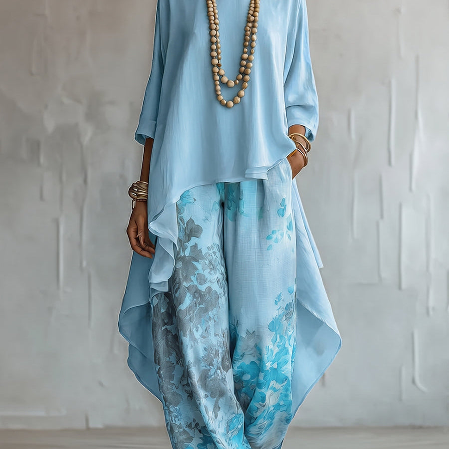 Top assimétrico e calças de perna larga com padrão floral – conjunto