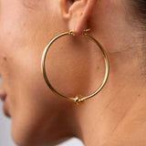 Brinco de Argola Nó Central Banhado em Ouro 18K